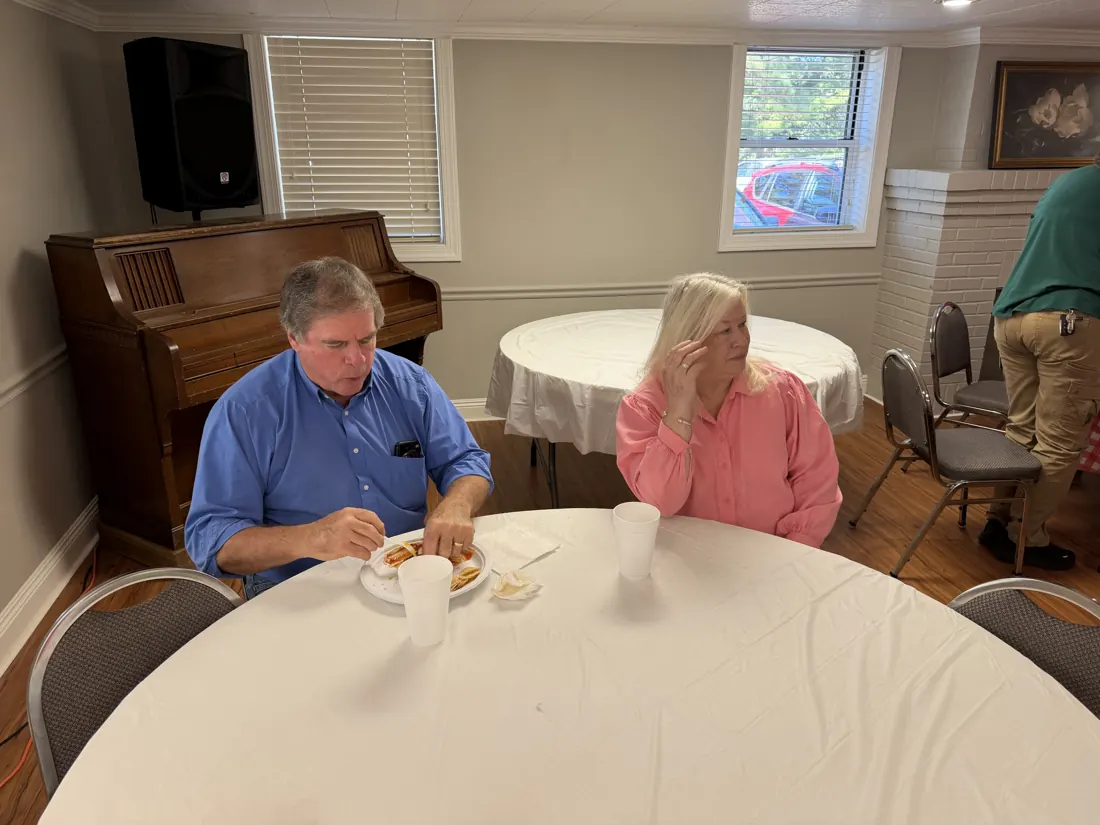 Friends sharing a meal at Woodville Baptist Church, photo 2